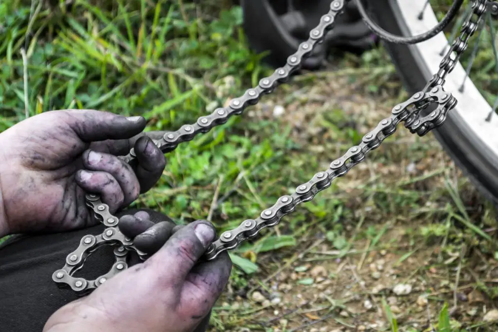 how to put chain back on bike bicycle chain 